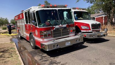 Image for story: House catches on fire after tree falls on power line