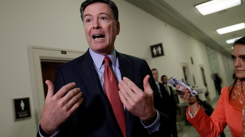 Former FBI Director James Comey speaks to reporters on Capitol Hill Washington, Monday, Dec. 17, 2018, after a second closed-door interview with two Republican-led committees investigating what they say was bias at the Justice Department before the 2016 presidential election. (AP Photo/J. Scott Applewhite)