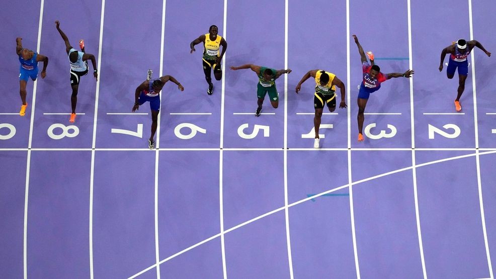 Image for story: US sprinter Noah Lyles wins first Olympic gold in nail-biting men's 100m final