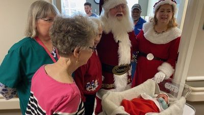 Image for story: PHOTOS: Santa surprises newborns at a Virginia hospital with handmade Christmas stockings