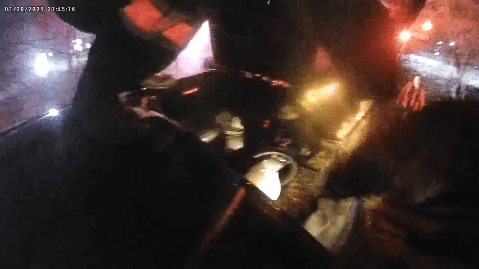 Image for story: Bodycam video from fiery crash rescue shows good Samaritan helping sheriff's deputy